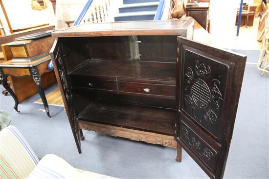 An early 20th century Chinese hongmu cabinet, W.3ft 9in. D.1ft 7in. H.3ft 11in.